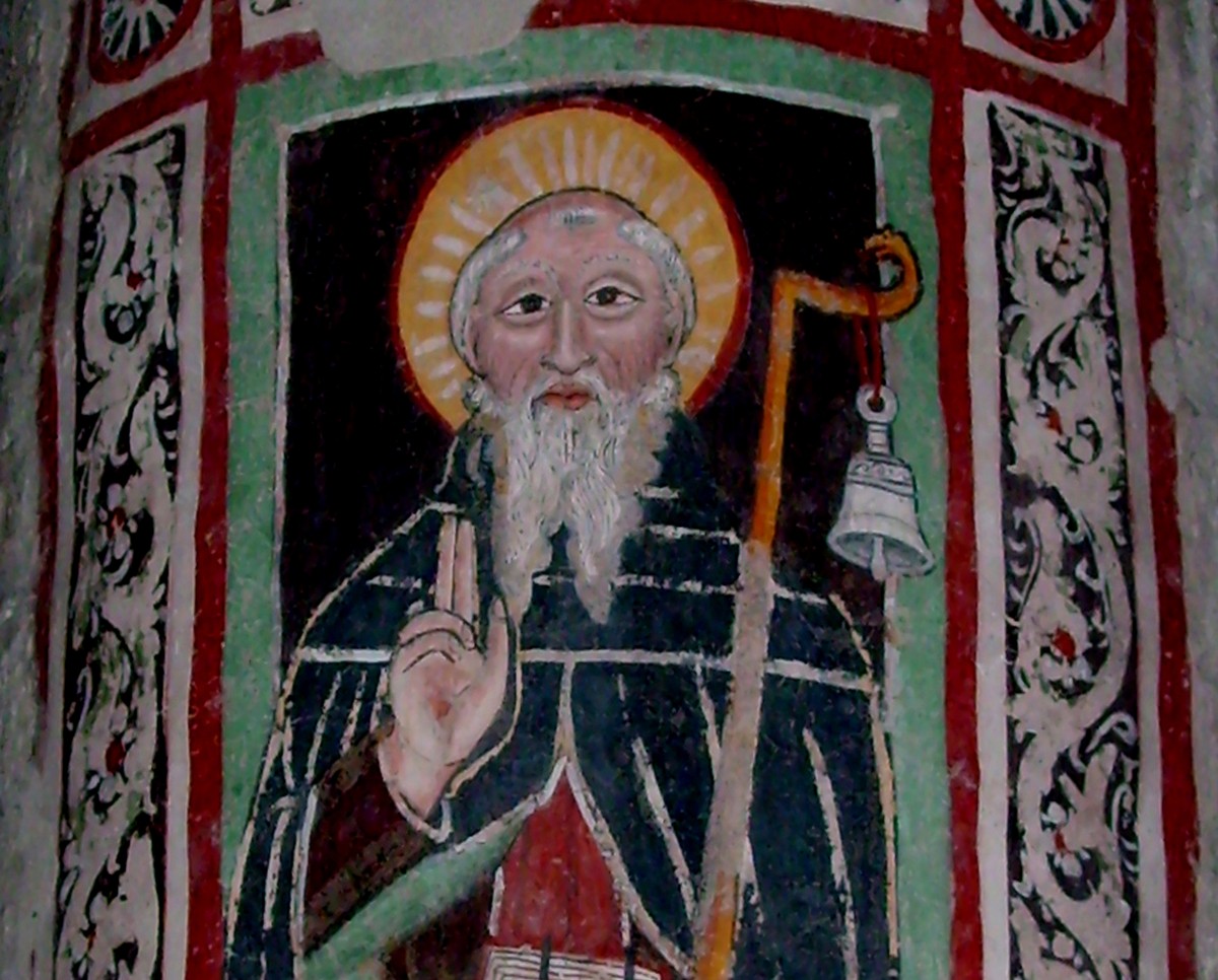 Der hl. Kolumban auf dem Weg von IONA nach Bobbio mit seiner Glocke am Wanderstab, Kirche San Pietro di Vara Carrodano, Brugnato, um 1350.