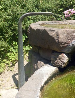 Brunneneinlauf in Dreipassform